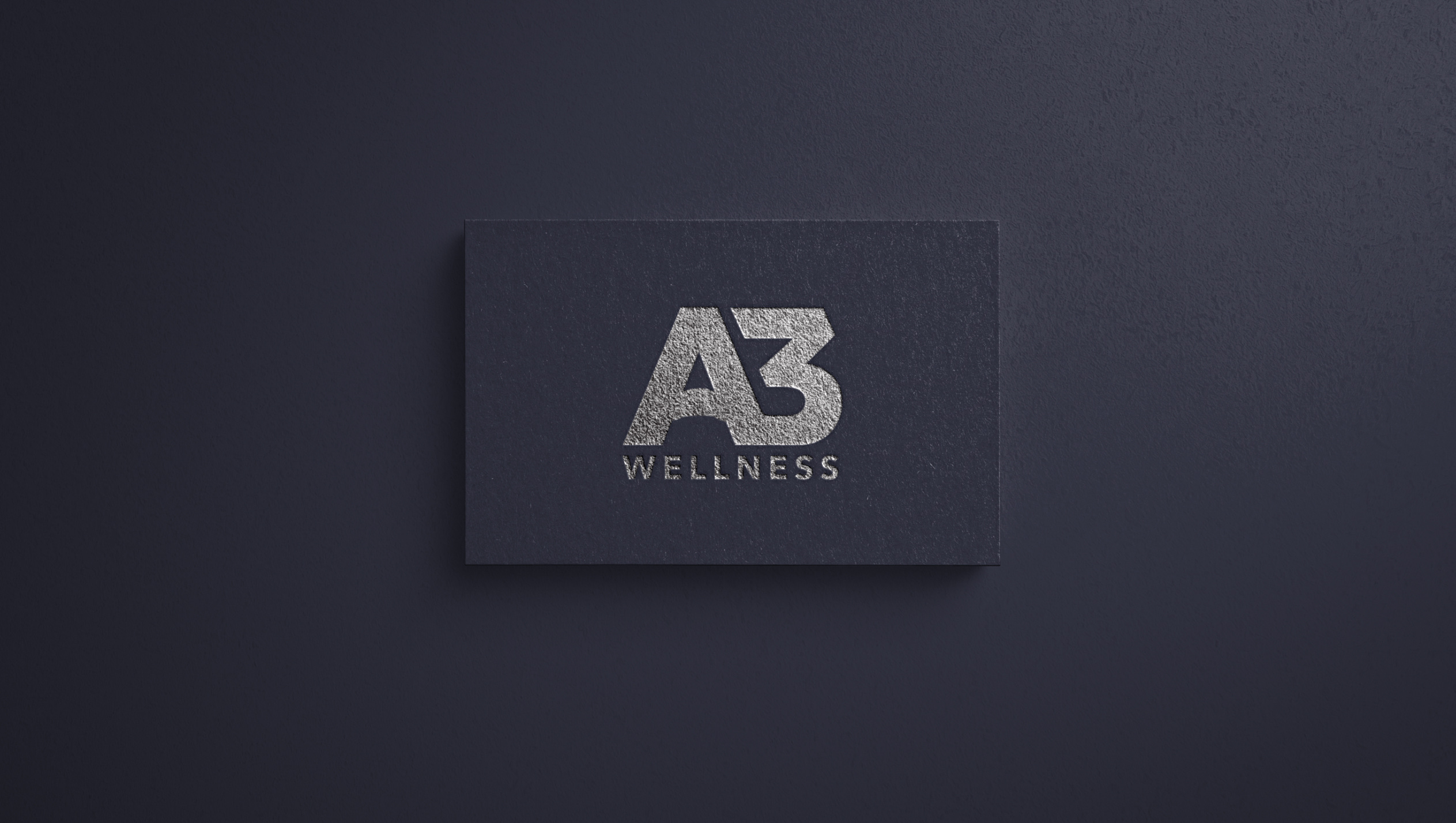 A3 Wellness monogram presented on a dark business card mockup