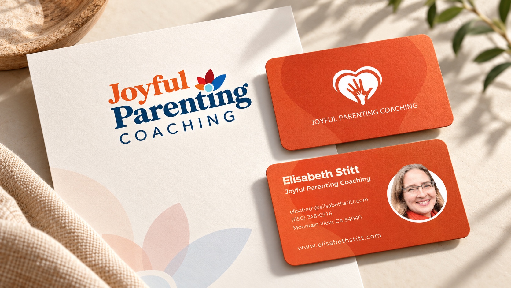 Joyful Parenting Coaching logo and business cards arranged in a warm editorial mockup